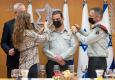 ערן ניב מקבל את דרגות האלוף מהרמטכ"ל, שר הביטחון ורעייתו, חגית. צילום: דו"צ, מתוך אתר צה"ל